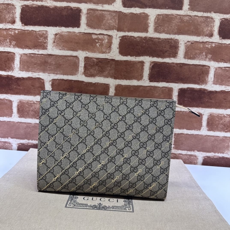 G*u*i clutch bags